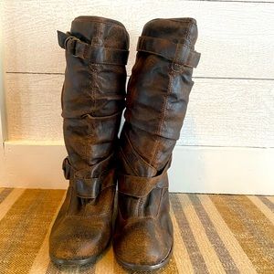 Distressed brown boots